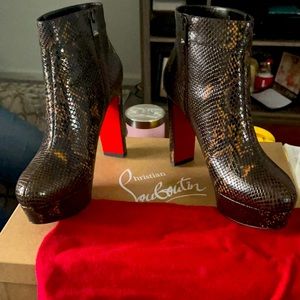 Christian Louboutin  color mix brown snake skin never been worn new